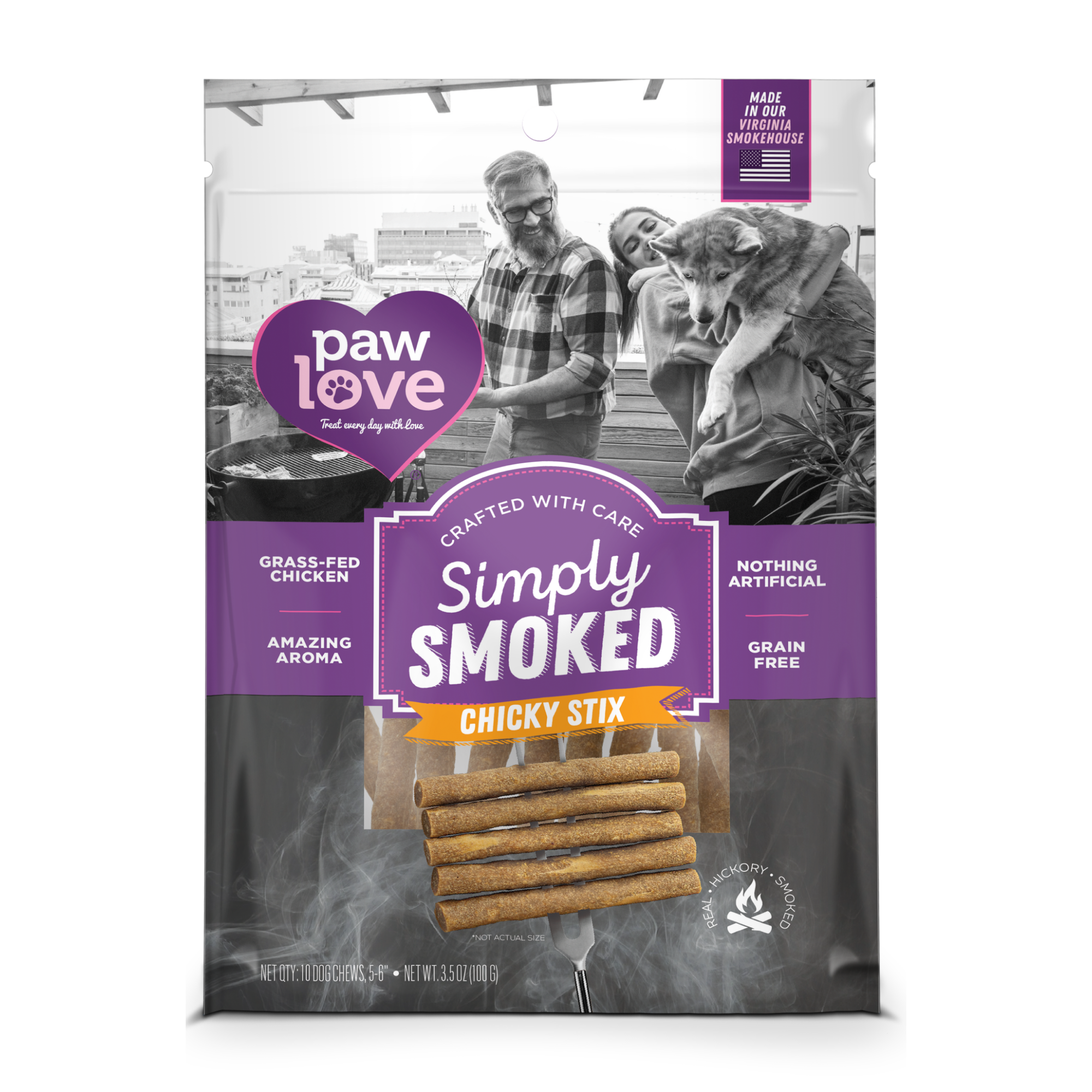 A black and white image of a package of "PW Simply Smoked Chicky Stix 10 Pack" dog treats, with a smiling man and woman feeding a dog in the background.